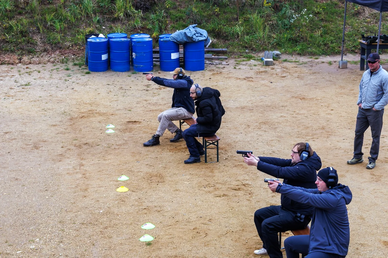 Practical Pistol students training pistol drills on the range at BZ Academy in Poland
